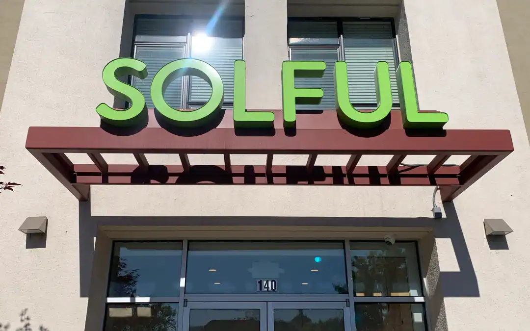 dimensional letters signage in front of a shop