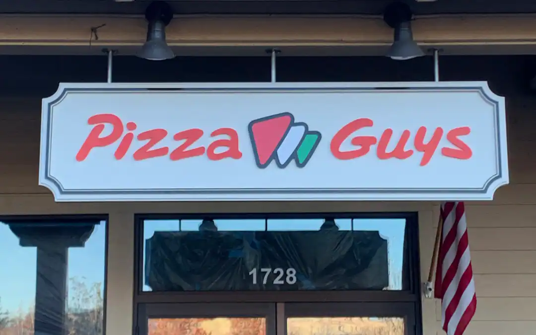 branded cabinet signage for a pizza shop