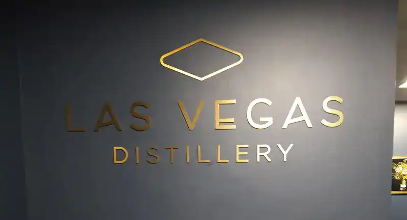 office logo signage in the wall